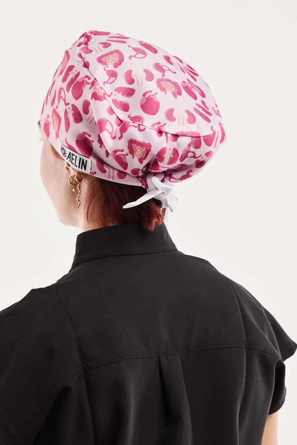 Aelin Paris calot de bloc organes roses cheveux courts
