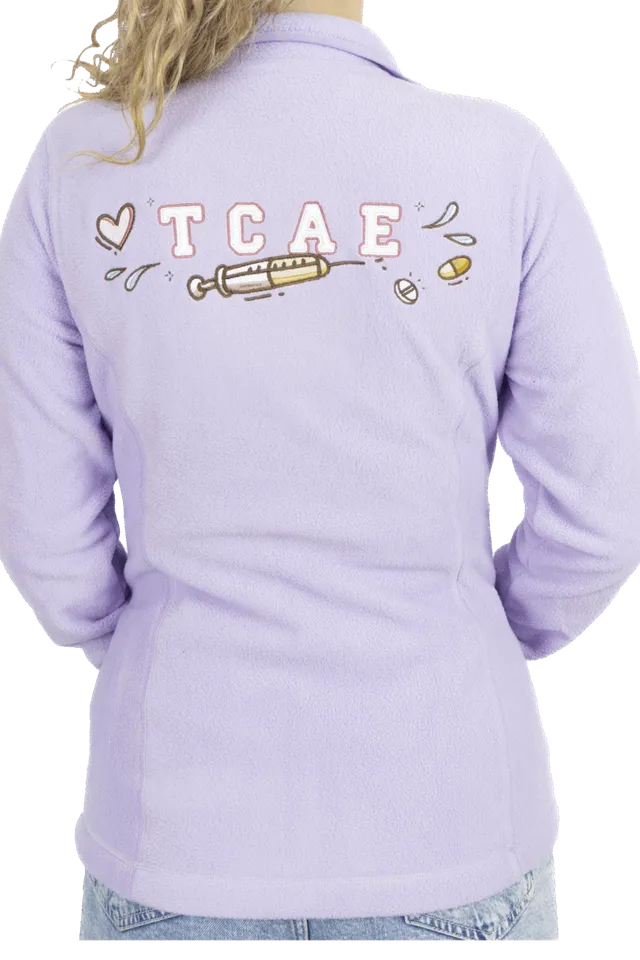 Enfermania Ropa TCAE polaire médicale femme lavande brodée