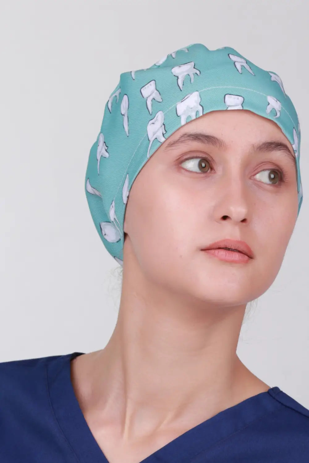 Aelin Paris calot de bloc vert turquoise imprimé dents