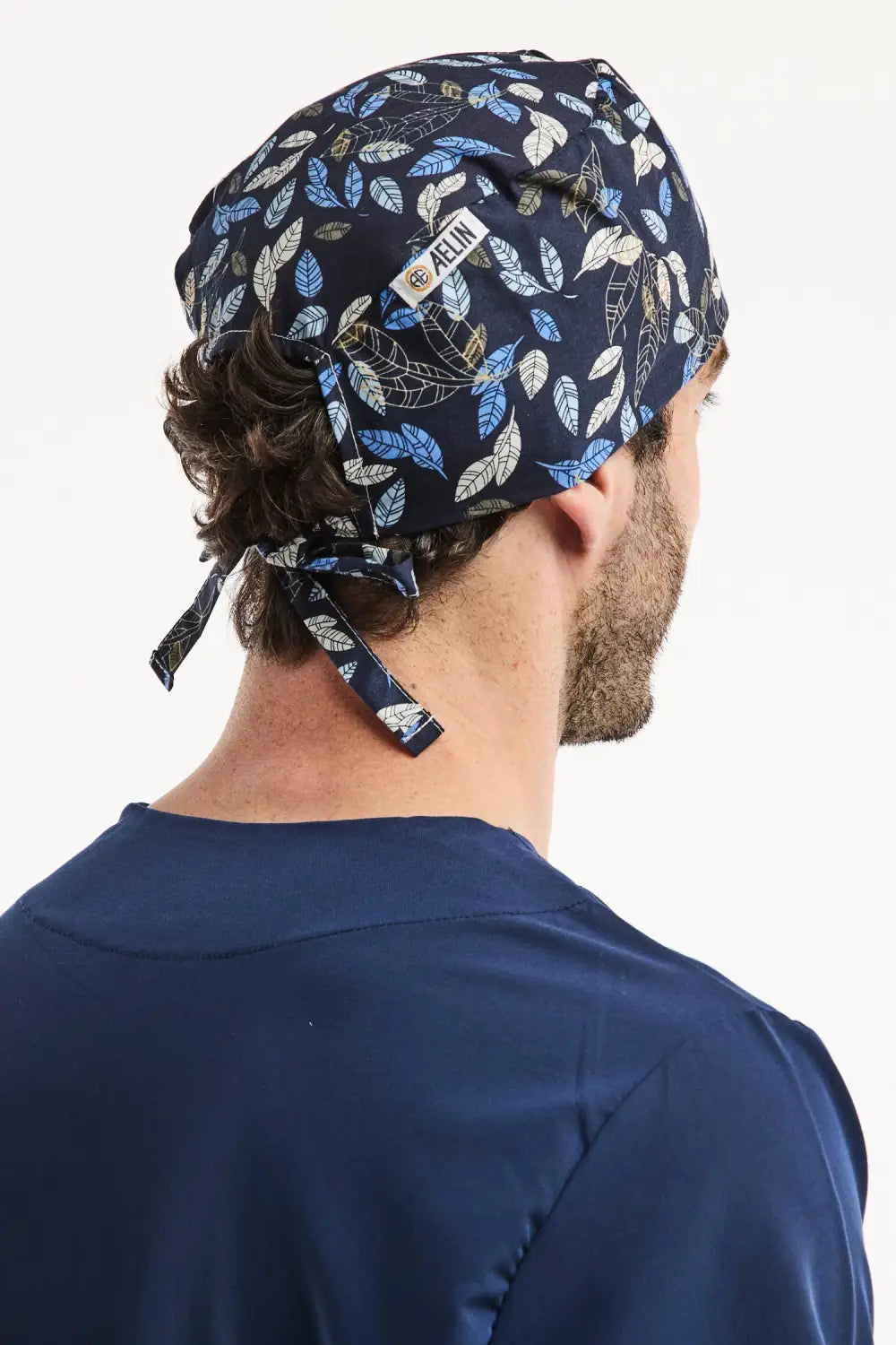 Aelin Paris calot de bloc bleu marine feuilles cheveux courts coton